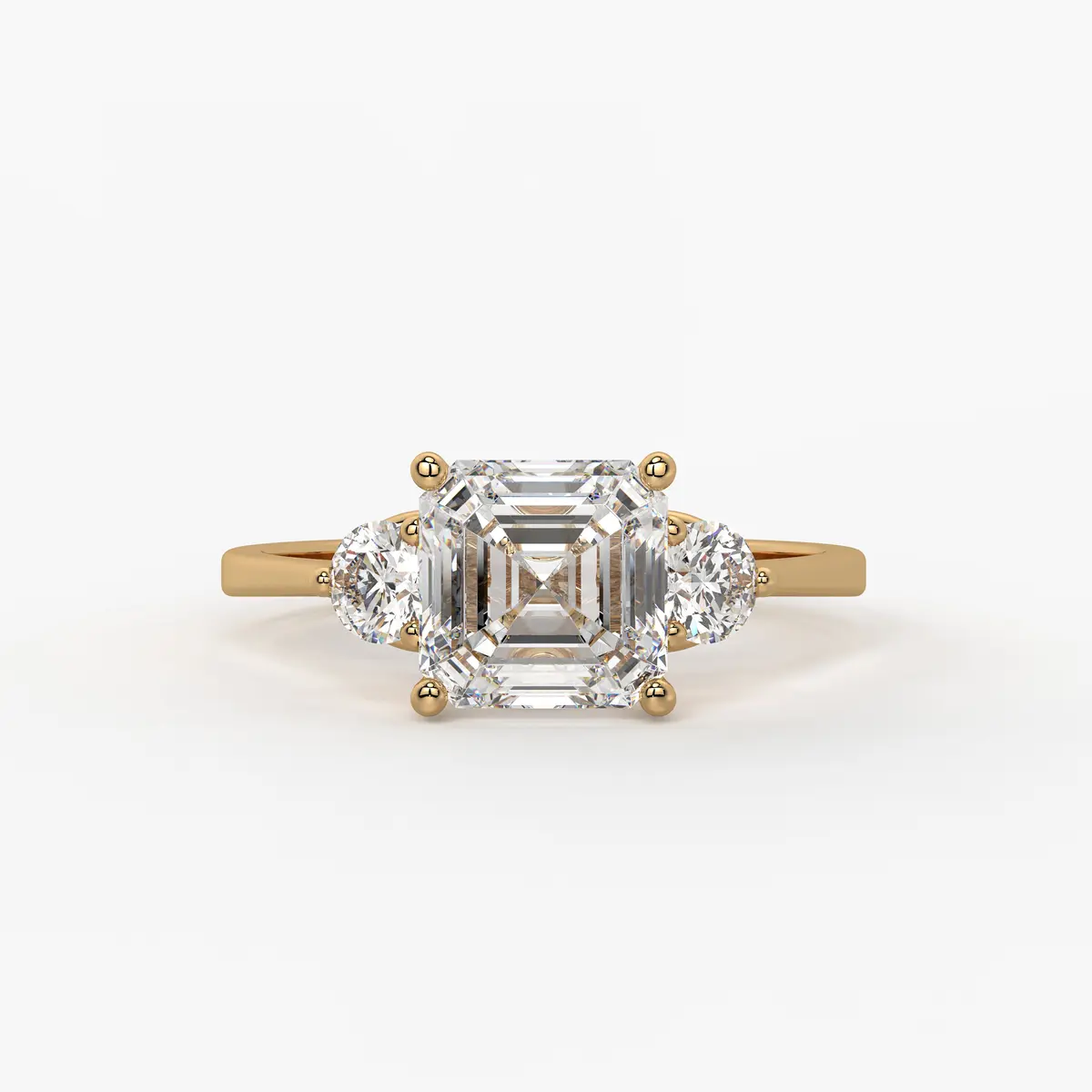 Emerald Trio Solitaire Ladies Ring