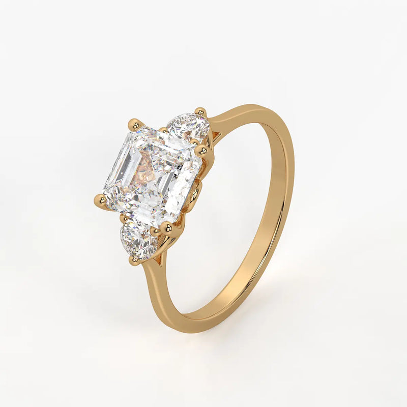 Emerald Trio Solitaire Ladies Ring