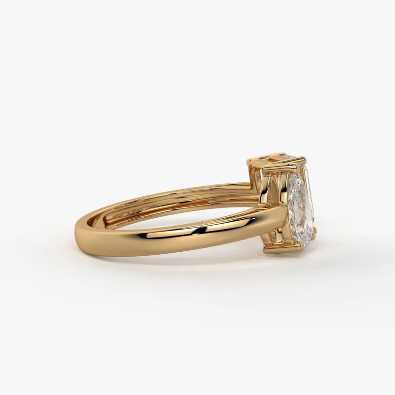 The Inara Pear & Emerald Fusion Ring